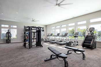 24-Hour fitness center with yoga and spin room